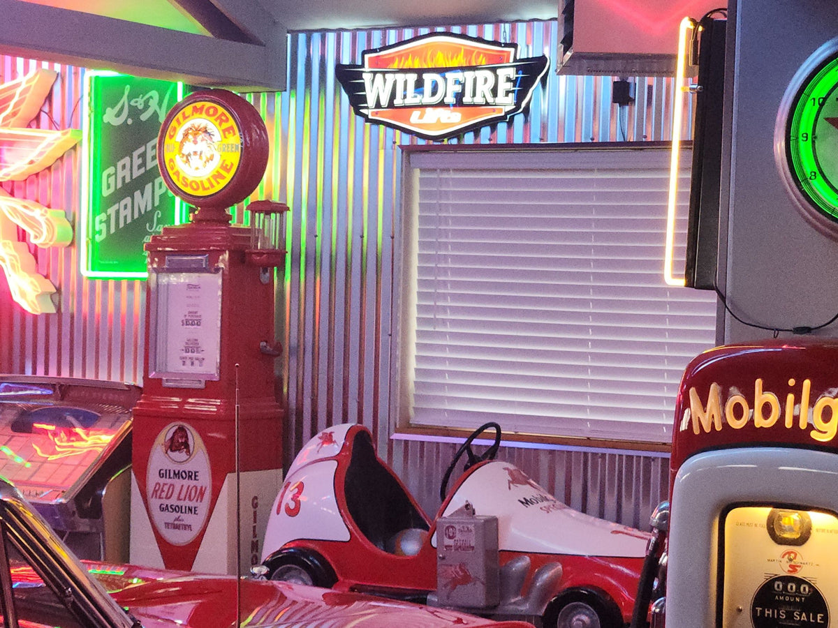 Wildfire Lifts illuminated wall sign enhancing garage décor